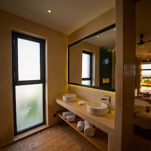 A modern bathroom with a large window, two sinks, and a mirror. - Baberrih (Moulay Bouzarqtoune)