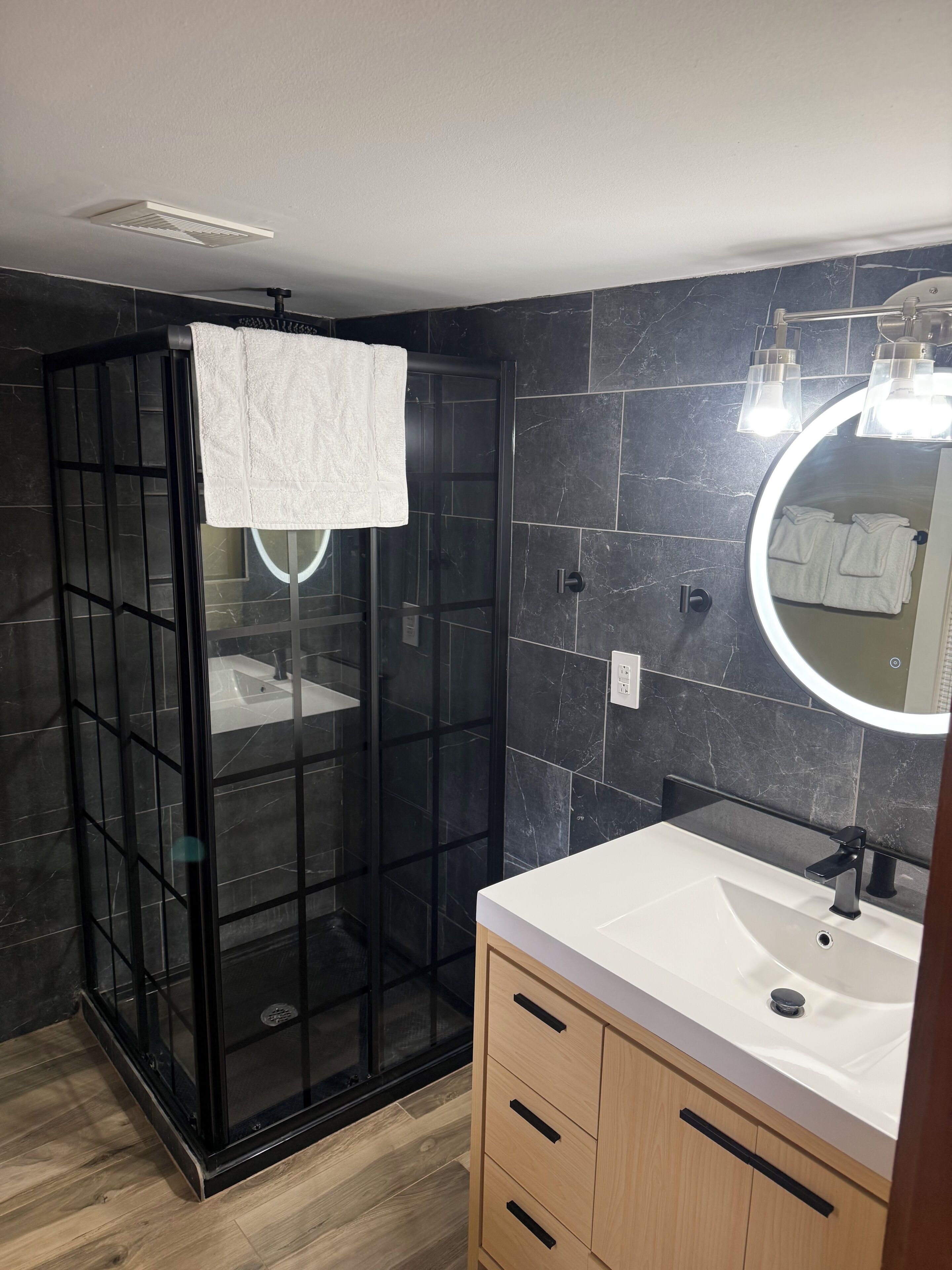 Shower, hair dryer, towels, soap