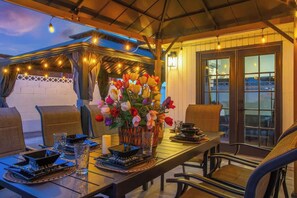 Outdoor dining - 7BR All-Star Retreat w/ Pool, Mini Golf & More! (North Las Vegas)