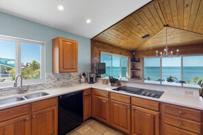 Fridge, microwave, oven, stovetop - Oceanfront Home w/ Dock, Kayak & Beach Area (Cudjoe Key)