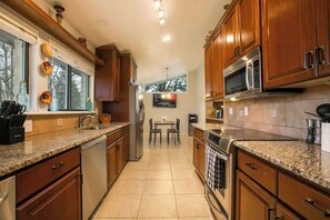Fridge, microwave, oven, stovetop - Elegant 5BR Home w/ *Heated* Pool & Pool Table (Albuquerque)