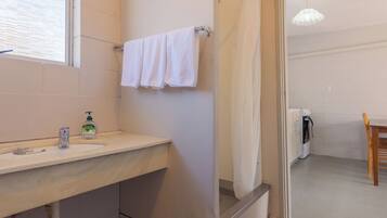 Standard Apartment, Multiple Beds | Bathroom | Shower, hair dryer, towels, soap