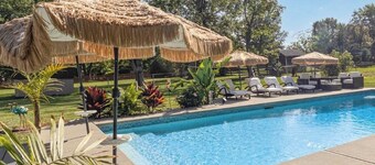 Barefoot Tiki Retreat -Inground Pool, Game Room, Theater Room, Firepit, Tiki Bar