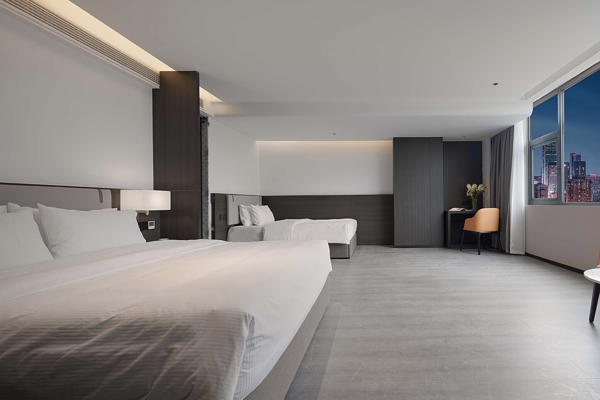 FamilieTwin kamer, uitzicht op de stad