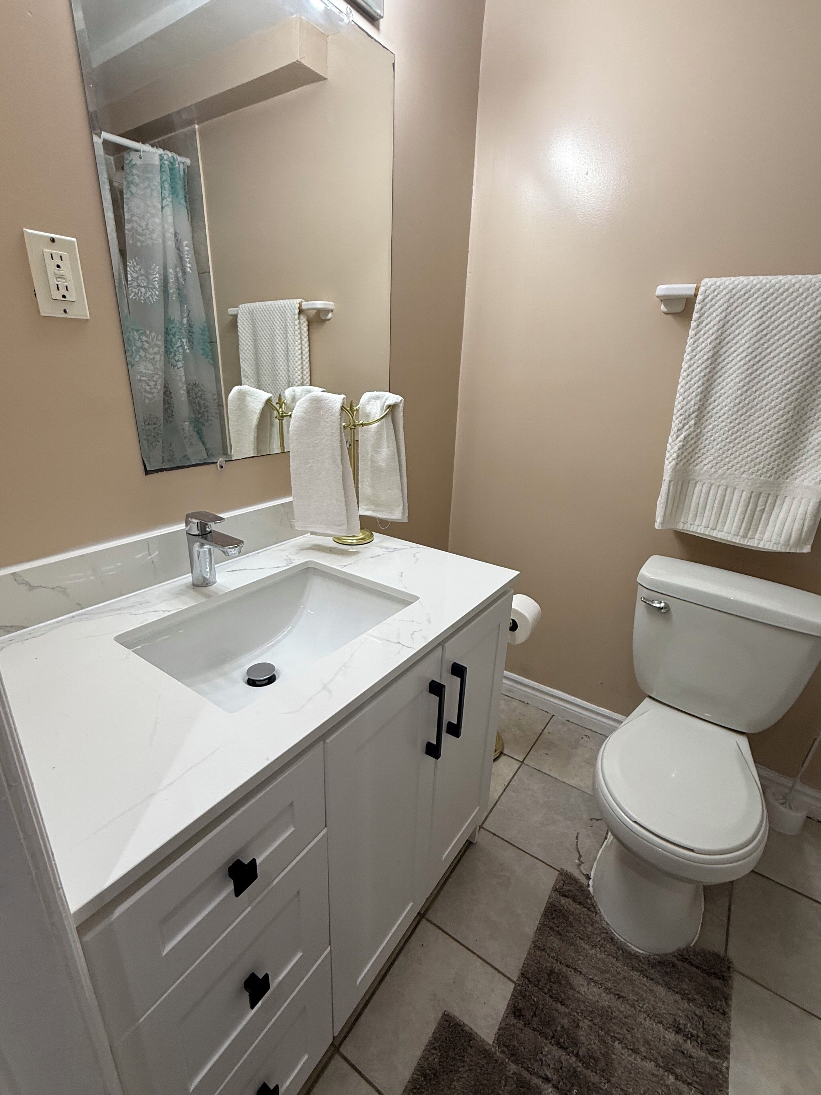 Hair dryer, towels, soap, toilet paper