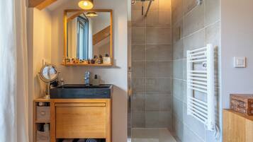 Shower, hair dryer, towels, toilet paper