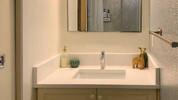 Shower, towels, soap, toilet paper