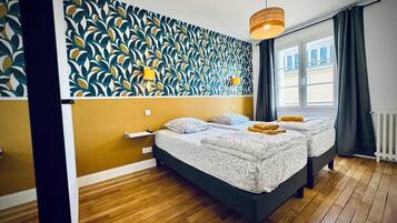 4 slaapkamers, een strijkplank/strijkijzer, wifi, beddengoed