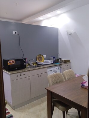 Private kitchen - Cozy 1-bedroom studio with AC in beautiful Ourgad (ourgad)
