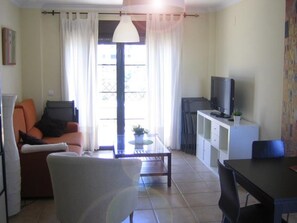 TV - Apartment with Terrace and AC in Coto - 2 Beds, Near La Barrosa Beach (Chiclana de la Frontera)