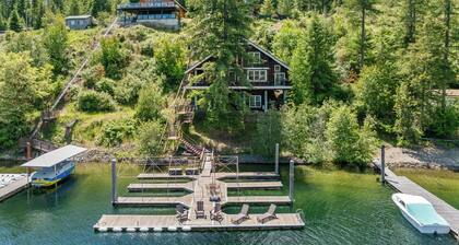 New Listing! Lakefront | Spacious Deck | Private Dock | Hot Tub | Tram