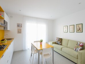 Apartment, 1 Bedroom, Balcony, Ocean View | Living room - Cozy and Colorful Accommodation (Lignano Sabbiadoro)