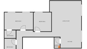 A floor plan with two bedrooms, two bathrooms, a living room, a kitchen, and a laundry room. - Spacious Modern Apartment in Central London (London)
