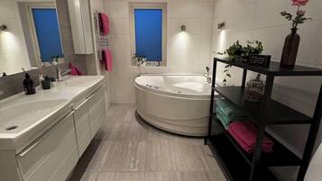 Shower, hair dryer, towels, toilet paper