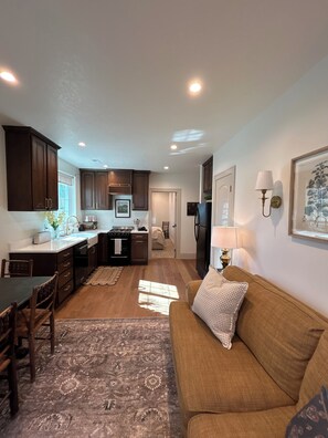 Living area - King’s Cottage Guesthouse-Adorable daylight basement apartment! (Mount Pleasant)