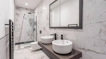 Hair dryer, towels, soap, toilet paper