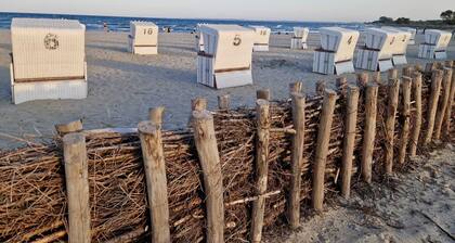 Cozy and barrier-free vacation apartment with balcony in Damp. Directly by the sea.