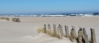 Cozy and barrier-free vacation apartment with balcony in Damp. Directly by the sea.