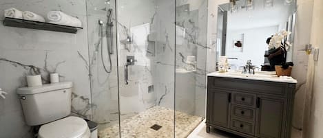 Hair dryer, towels, soap, toilet paper