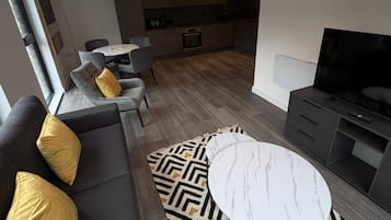 Appartamento Superior, balcone, vista città | Area soggiorno