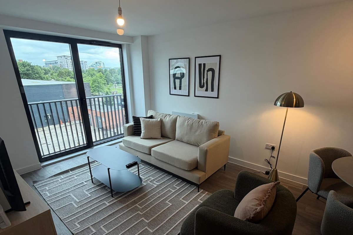 Business Apartment, 2 Bedrooms, Non Smoking | Living area | 55-inch Smart TV with digital channels