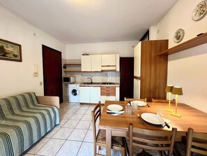 Apartment, 2 Bedrooms, Balcony, City View | Dining room - Lignano Pineta Flat With Balcony (Lignano Sabbiadoro)