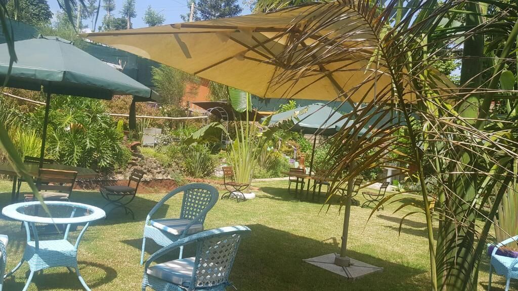 Deluxe Double Room, Balcony, Courtyard View | Outdoor dining