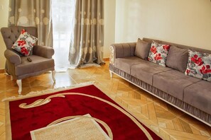 Apartament, balcó, vistes a la ciutat | Sala d'estar