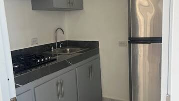 Comfort Suite, Ocean View | Private kitchen