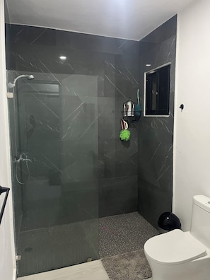 Comfort Suite, Ocean View | Bathroom | Towels, soap, shampoo, toilet paper
