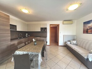 Apartment, 2 Bedrooms, Balcony, City View | Living room - Elegant Flat Steps From Beach (Lignano Sabbiadoro)