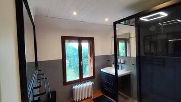 Shower, hair dryer, towels, soap