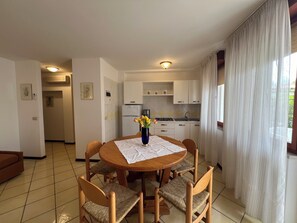 Apartment, 1 Bedroom, Patio, Garden View | Dining room - Lignano Apartment With Terrace (Lignano Sabbiadoro)