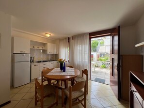 Apartment, 1 Bedroom, Patio, Garden View | Dining room - Lignano Apartment With Terrace (Lignano Sabbiadoro)