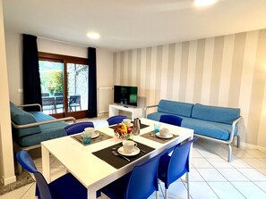 Villa, 4 Bedrooms, Balcony, Garden View | Dining room - Villa With Pool in Lignano (Lignano Sabbiadoro)