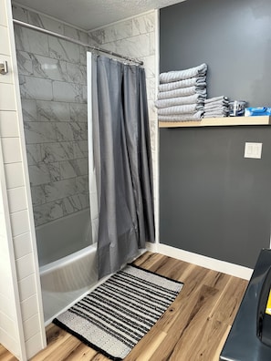 Hair dryer, towels, soap, shampoo