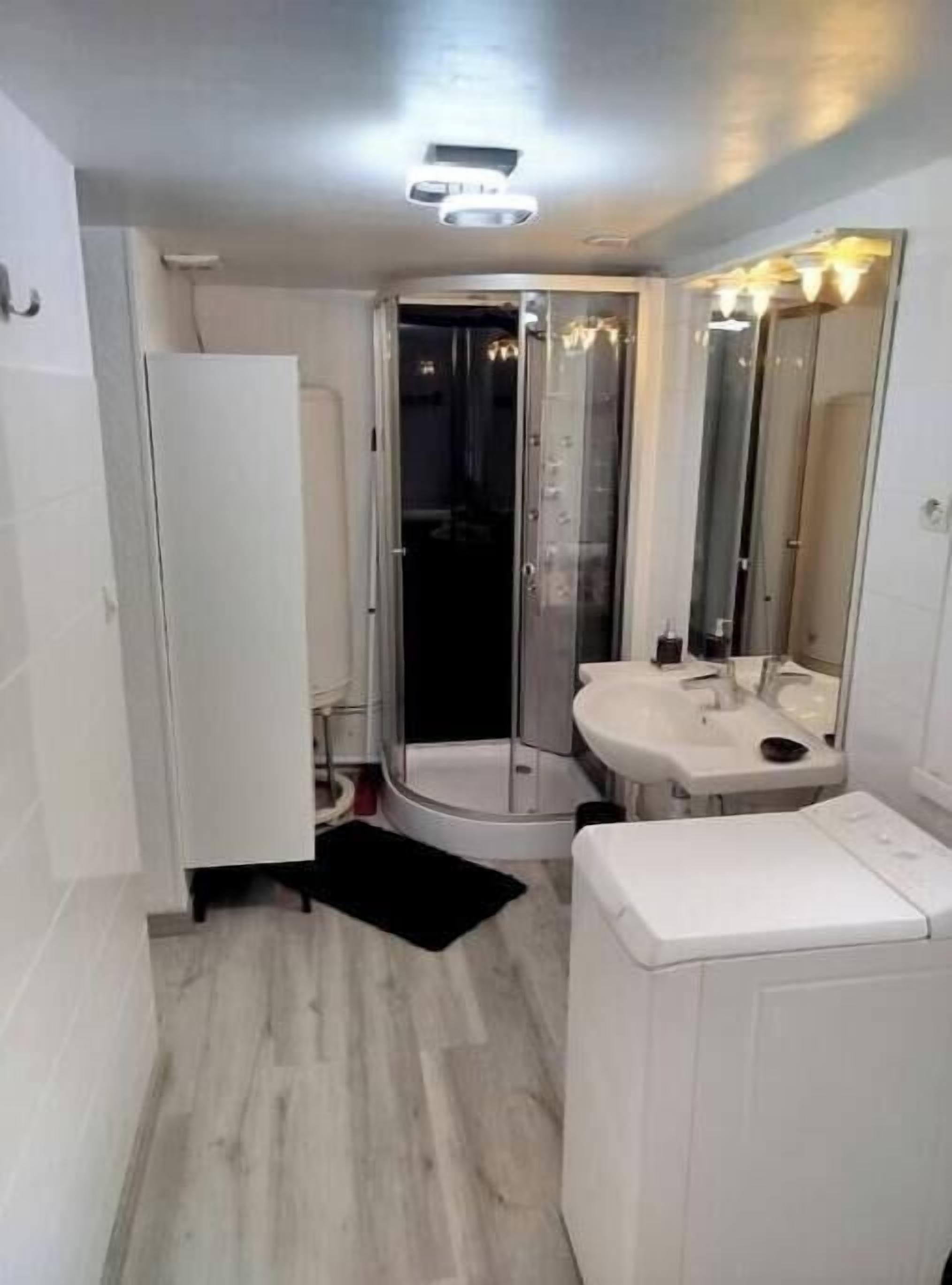 Shower, towels, toilet paper