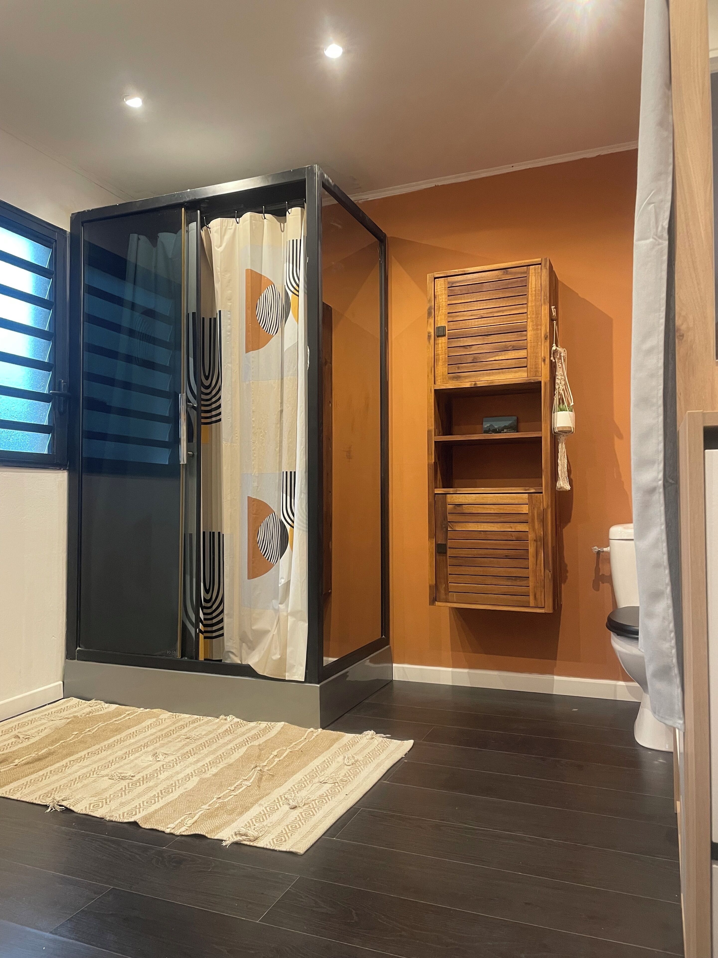 Shower, towels, soap, toilet paper