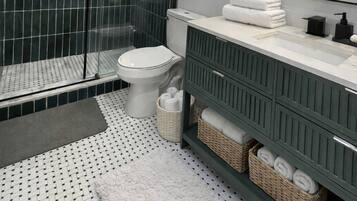 Shower, hair dryer, towels, soap