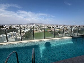 Outdoor pool -  Miraflores 1BR Apartment | Rooftop Pool, WiFi, Co-Work & City Views (Miraflores)