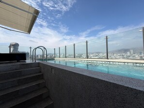 Outdoor pool -  Miraflores 1BR Apartment | Rooftop Pool, WiFi, Co-Work & City Views (Miraflores)