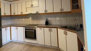 Private kitchen - Quaint 3-bedroom apartment in charming Ásbrú neighborhood (Ásbrú)