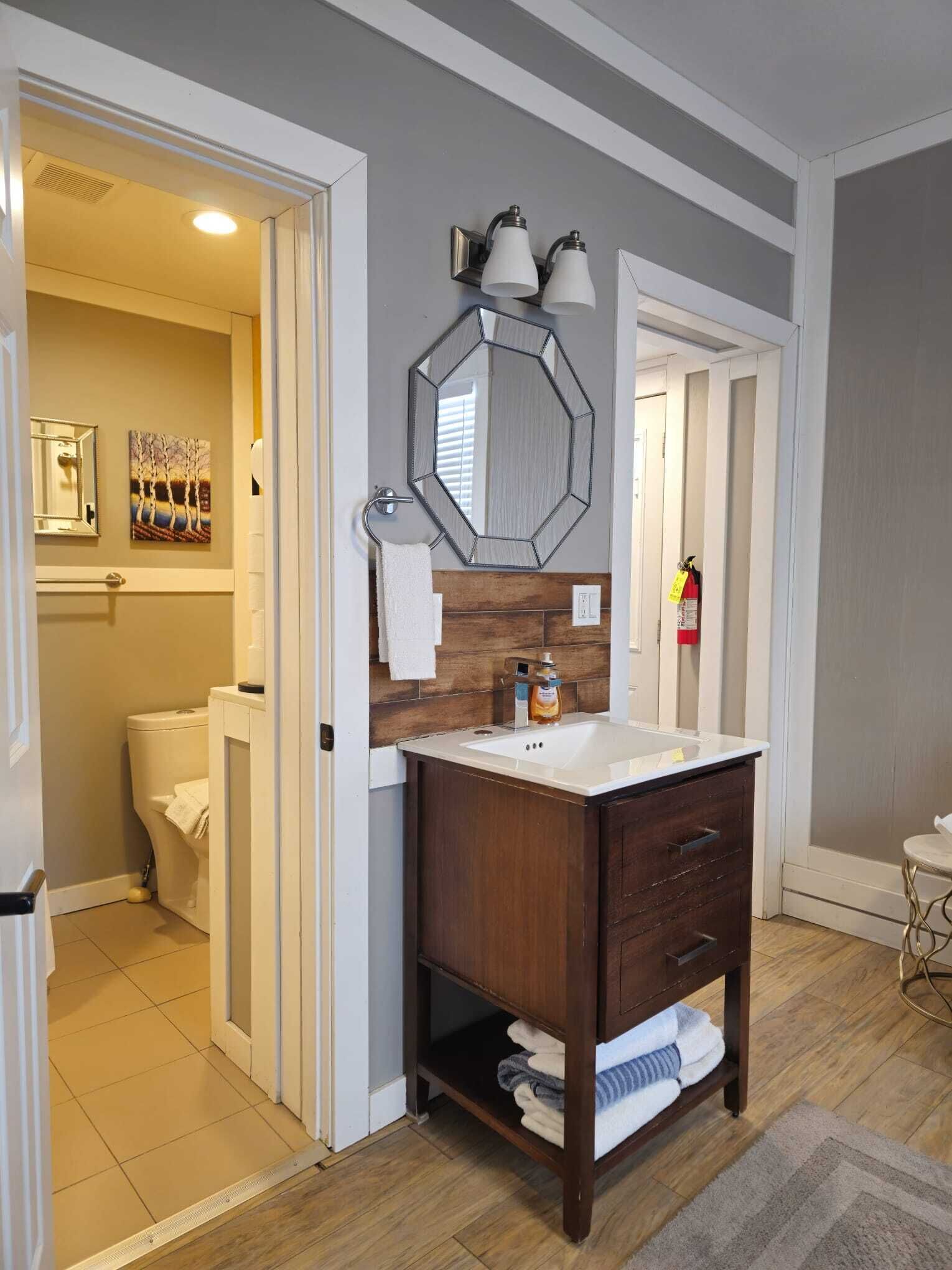 Hair dryer, towels, soap, toilet paper