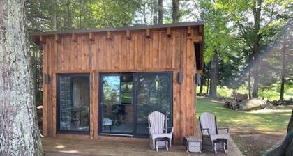 Wonderful historic rustic "Ogeedankee" cabin with 5 bedrooms and mountain views.