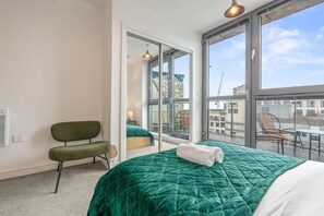 2 dormitorios, tabla de planchar con plancha, Internet y ropa de cama