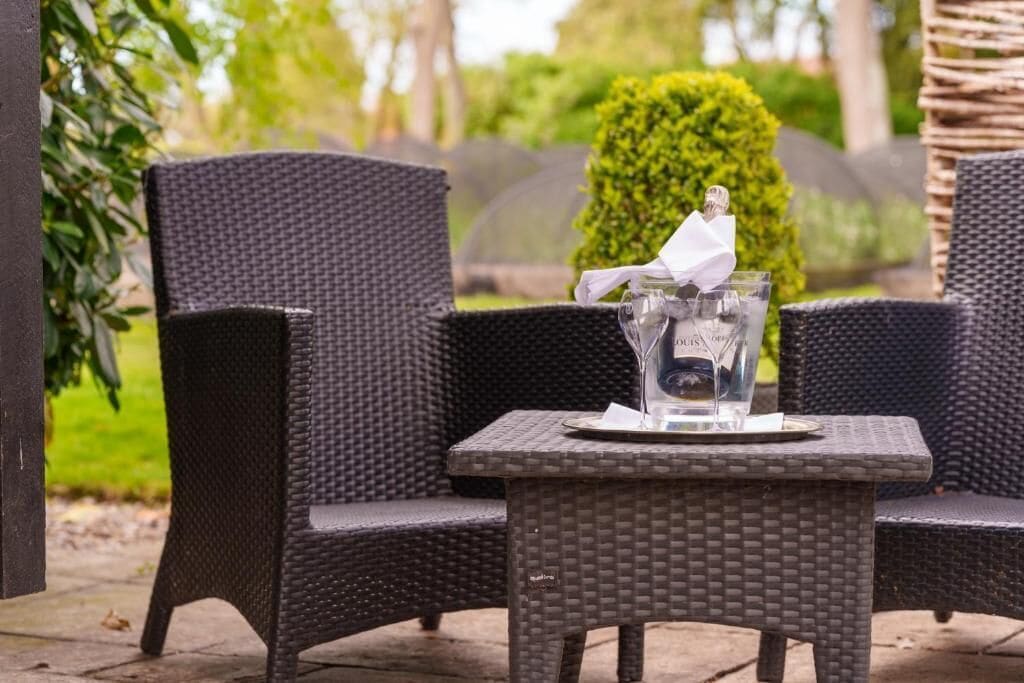 Grand Studio Suite, Patio, Garden View | Property grounds