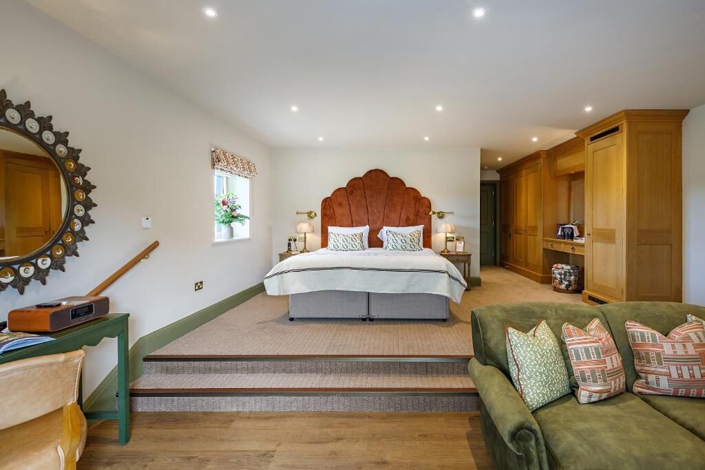 Grand Studio Suite, Patio, Garden View | In-room safe, individually decorated, individually furnished