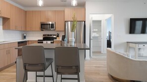 Fridge, dining tables - Landing | Beautiful 2BD, Clubhouse, Gym (Kissimmee)