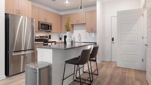 Fridge, dining tables - Landing | Modern 1BD, Clubhouse, Gym (Kissimmee)