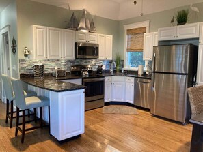 Fridge, microwave, oven, stovetop - Seaglass Village 705, a stylish 2-bedroom retreat in Wells. (Wells)